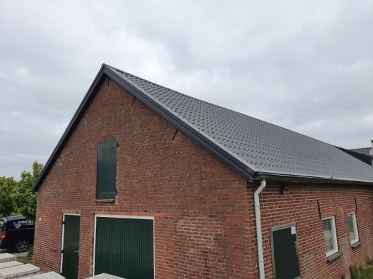 Renovatiee met dakbeplating Langenboom