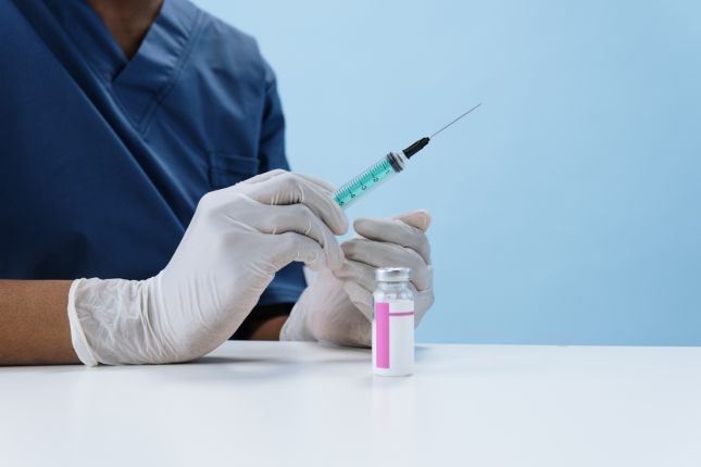 Vaccin minister